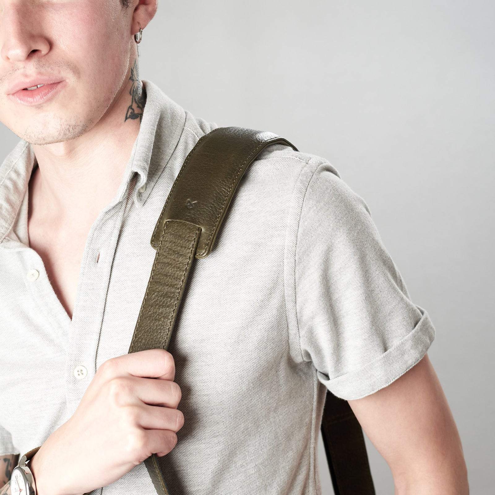 Style. Shoulder strap detail of green Roko by Capra Leather.