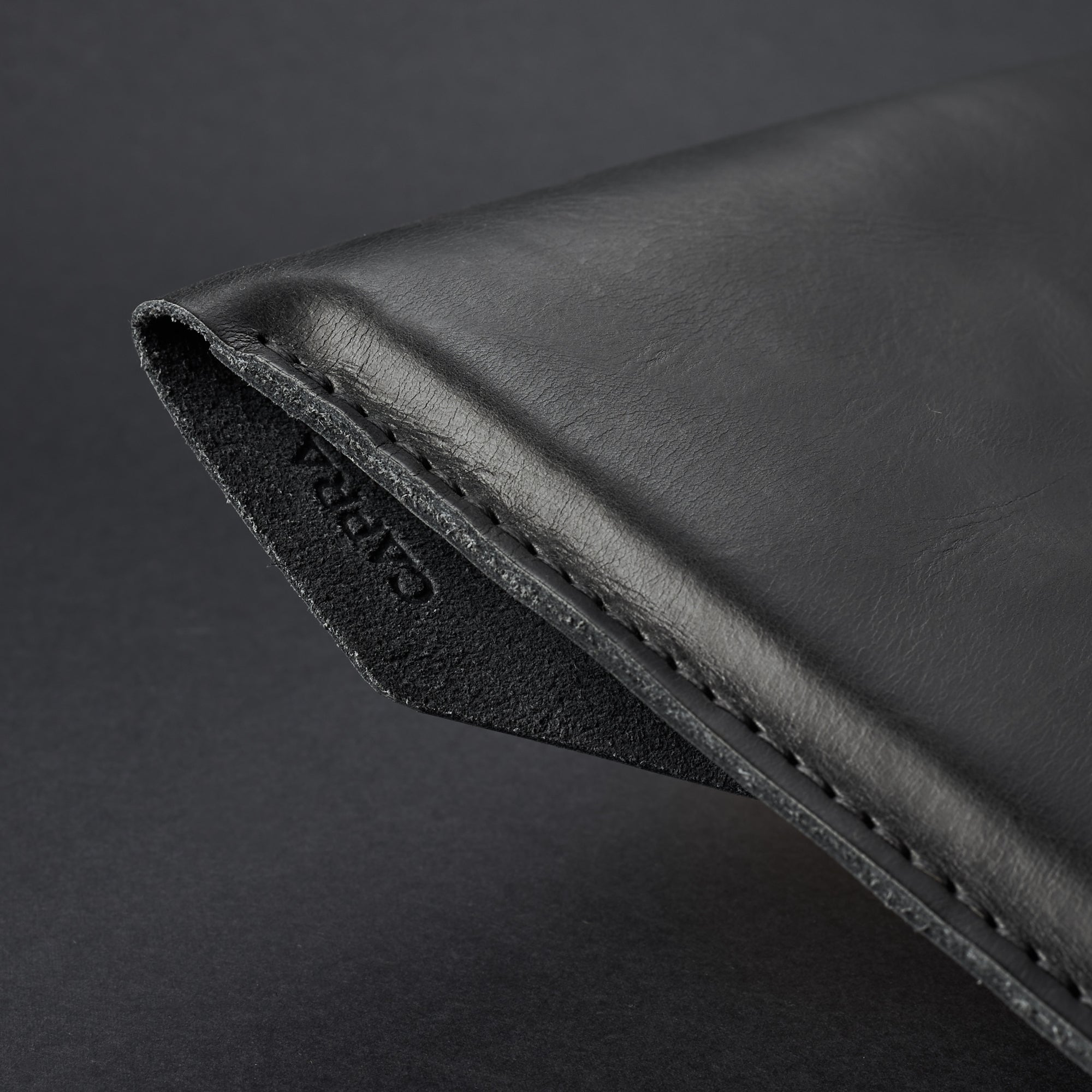 Hand stitching. Black Leather MacBook Case. Slant MacBook Sleeve by Capra Leather