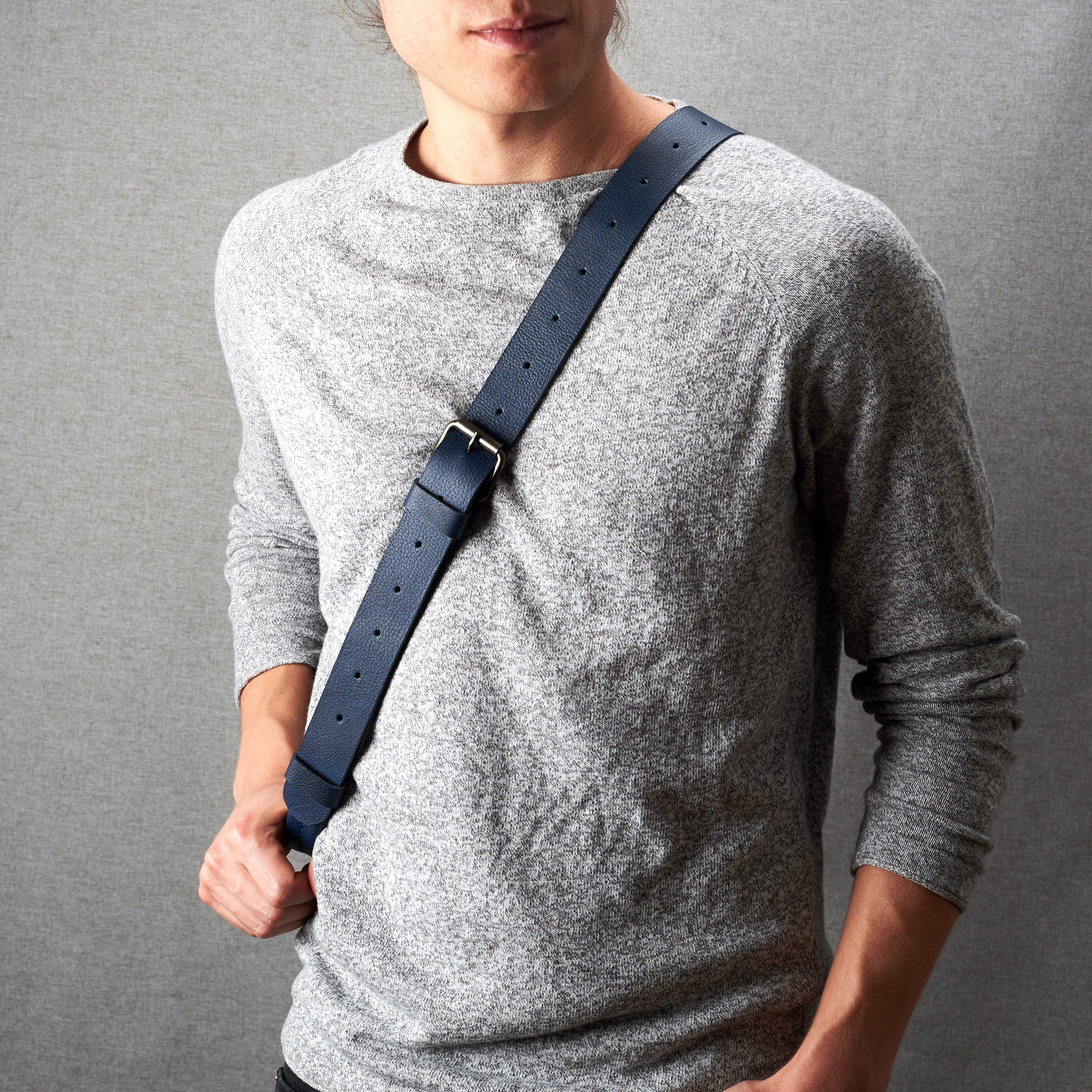 Styling shoulder strap. Fenek blue sling bag for men by Capra Leather. Bicycle backpack, everyday carry messenger bag.