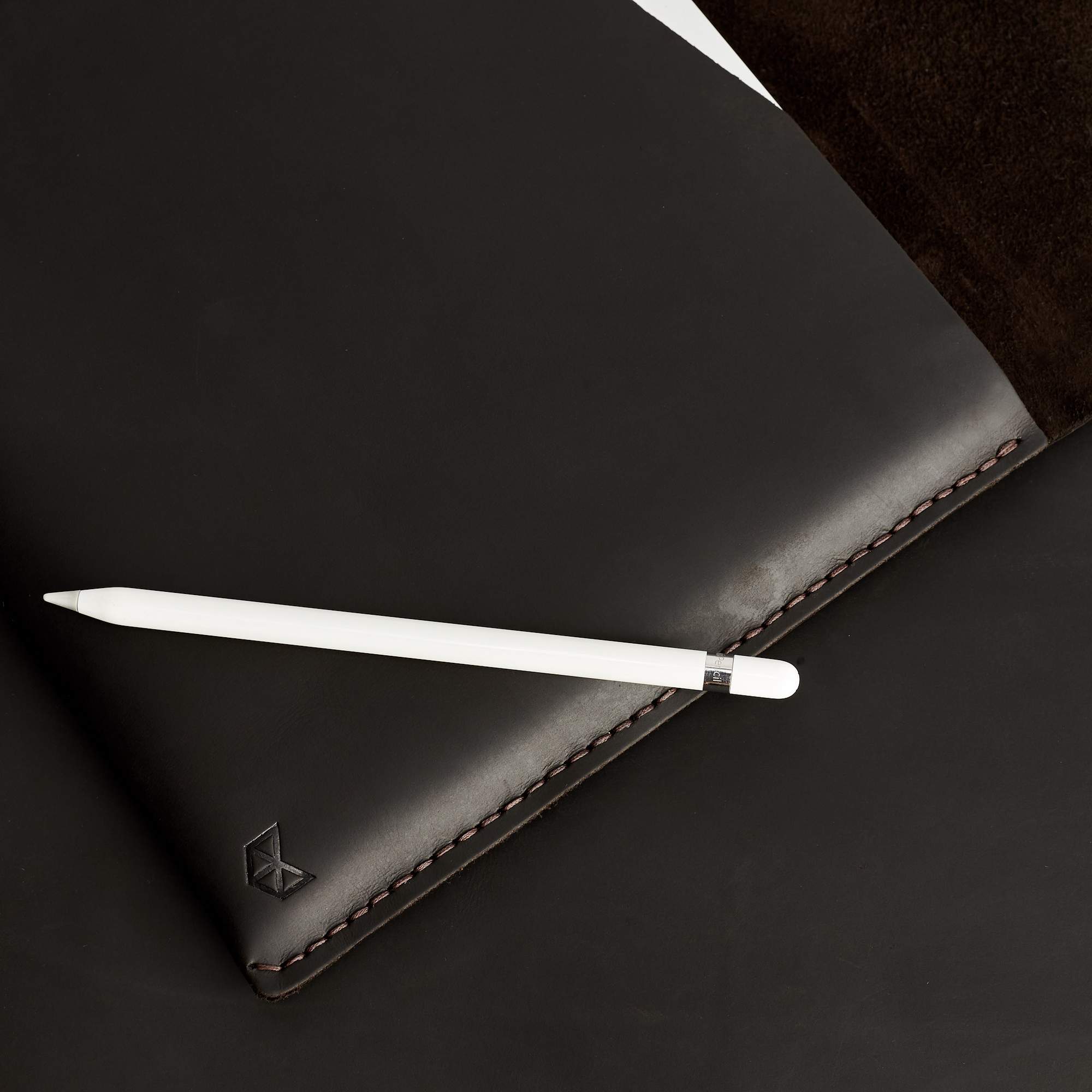 Style photo with marker pen. Brown handcrafted leather reMarkable tablet case. 