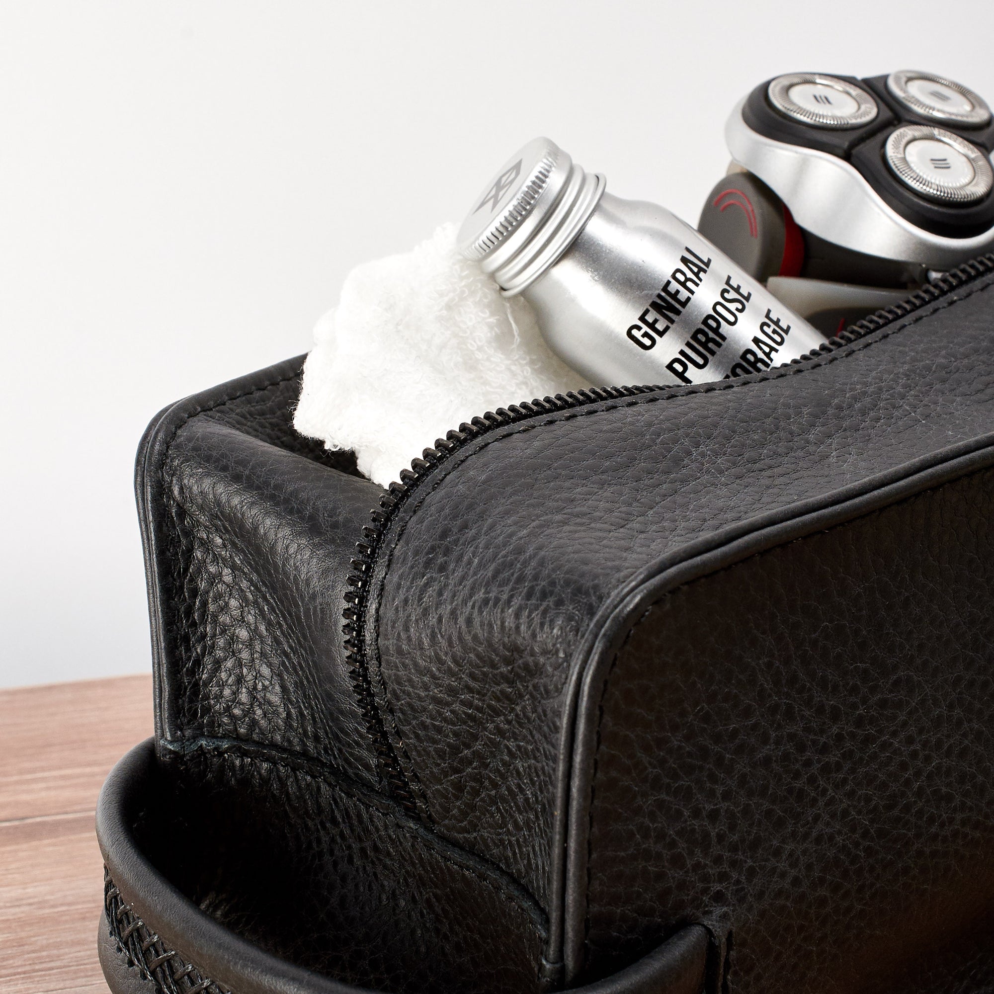 Dopp kit and toiletries. Black leather toiletry, shaving bag with hand stitched handle
