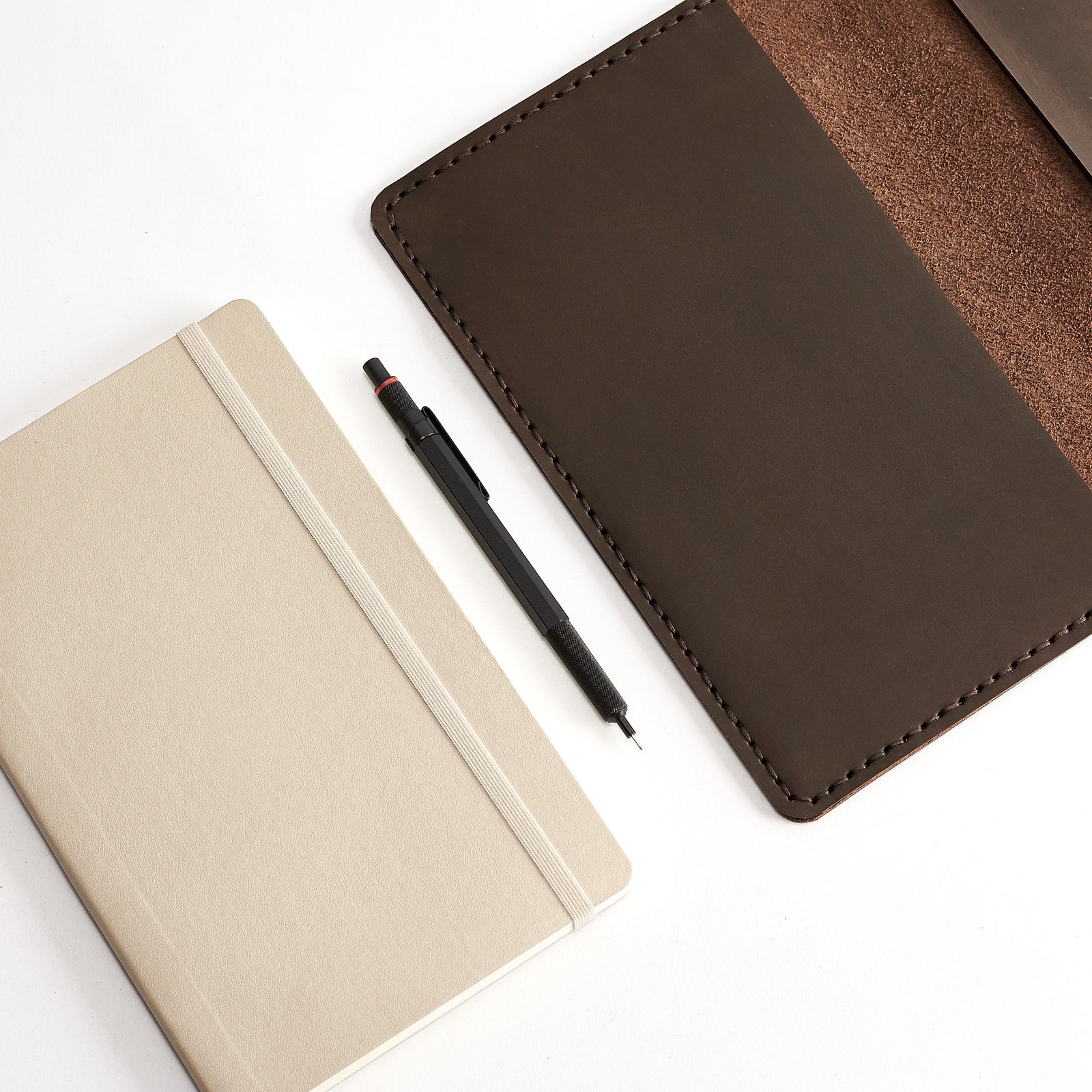 Front. Entirely hand stitched Moleskine Large and Pocket leather cover. Traveler's journal case.