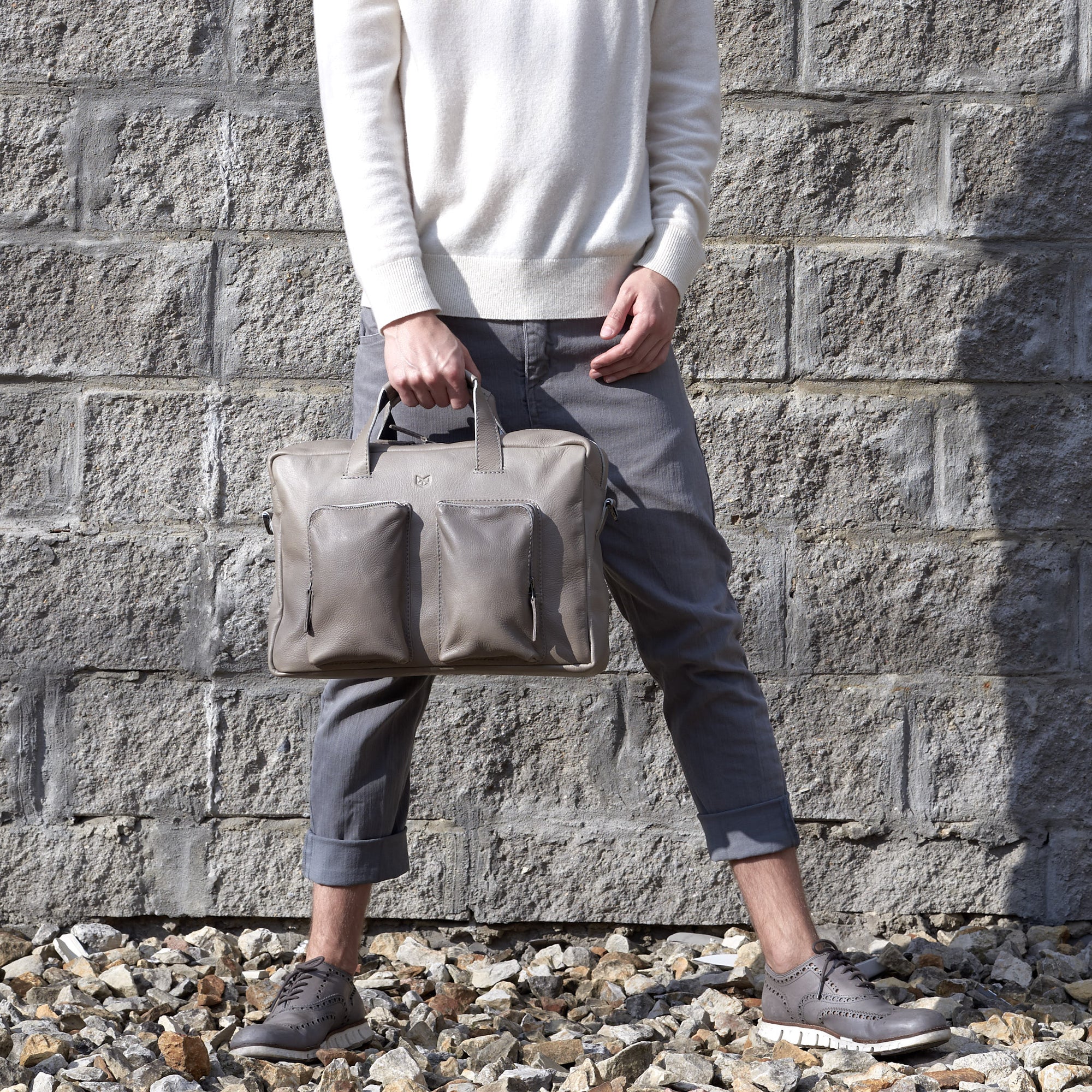 Front view. Grey handmade leather messenger bag for Men by Capra Leather. Commuter bag, mens weekender bag.