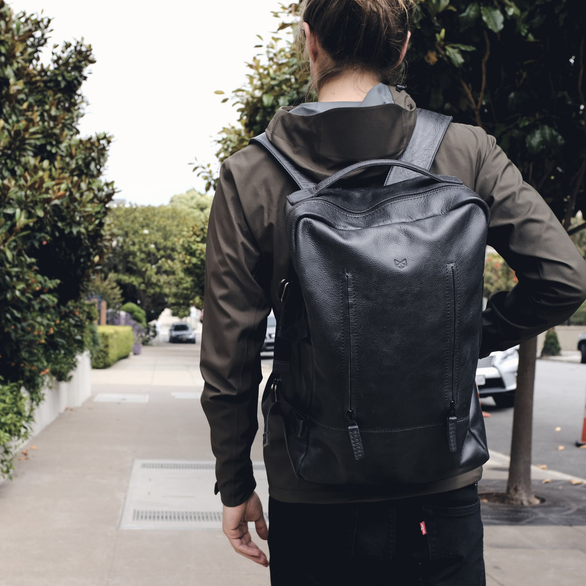 Style street look. Black leather backpack for men. Personalized gifts for men