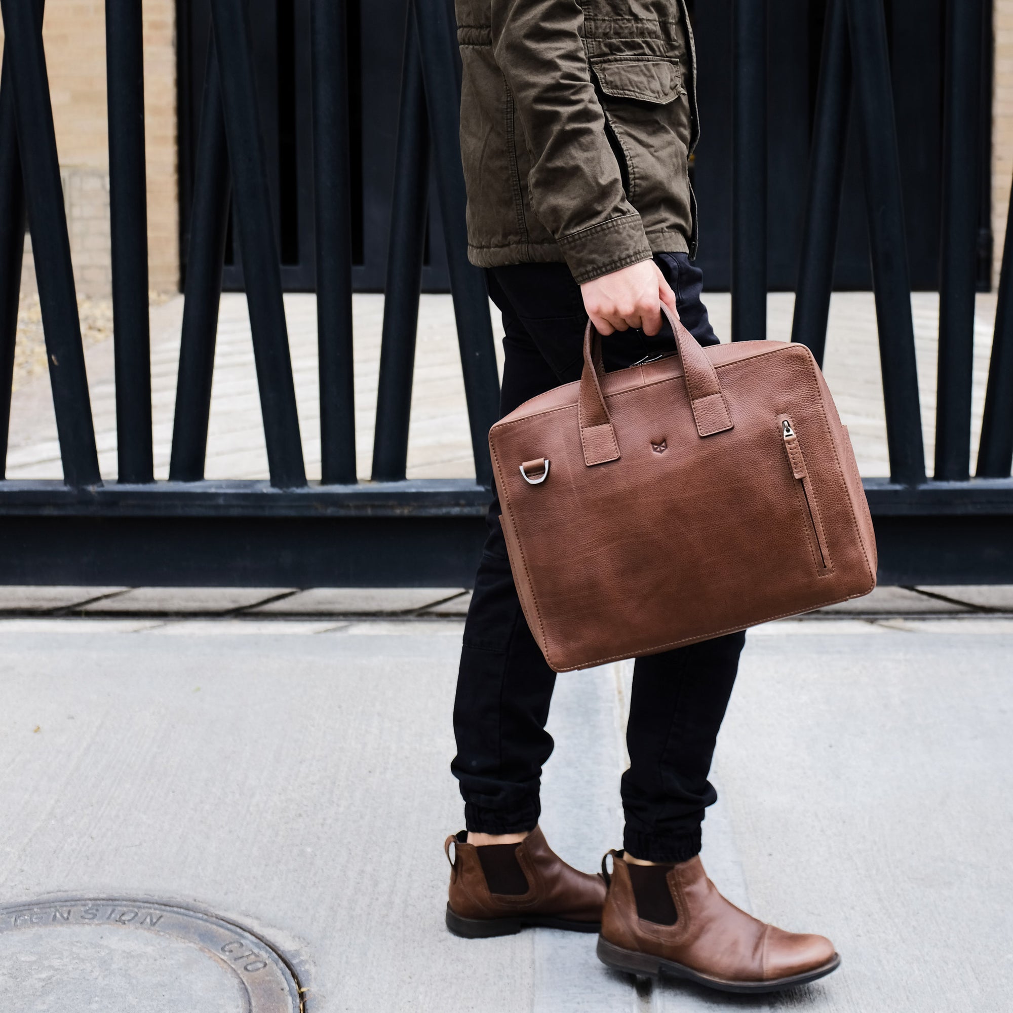 Urban style. Brown soft leather briefcase. Designer mens satchel