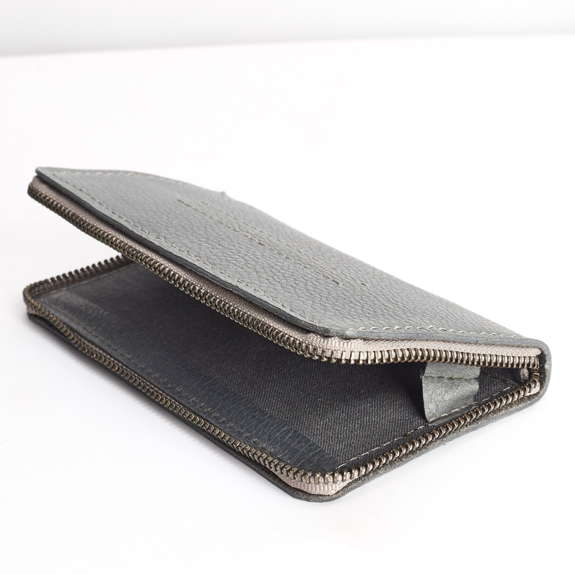 Linen interior detail. Grey iPhone leather wallet stand case for mens gifts. iPhone x, iPhone 10, iPhone 8 plus leather stand sleeve