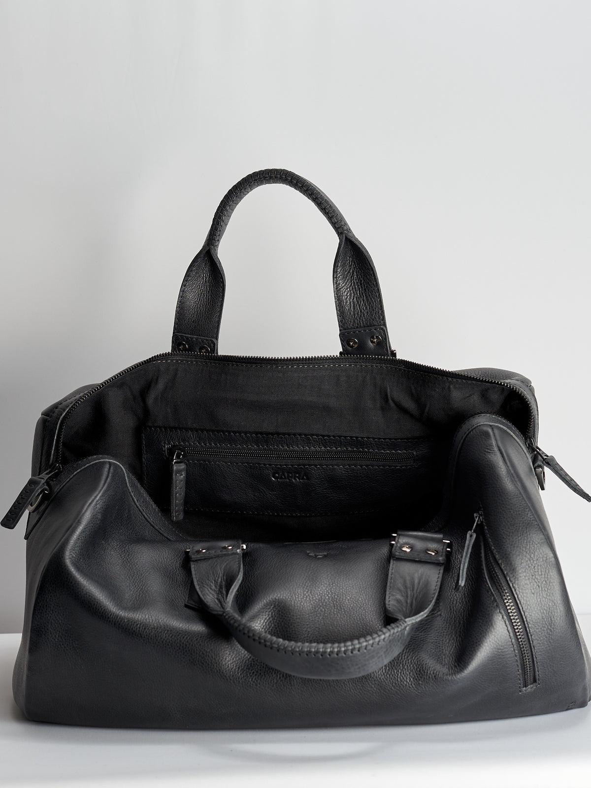 Linen interior. Black leather work out bag for men. Designer weekender travel bag 