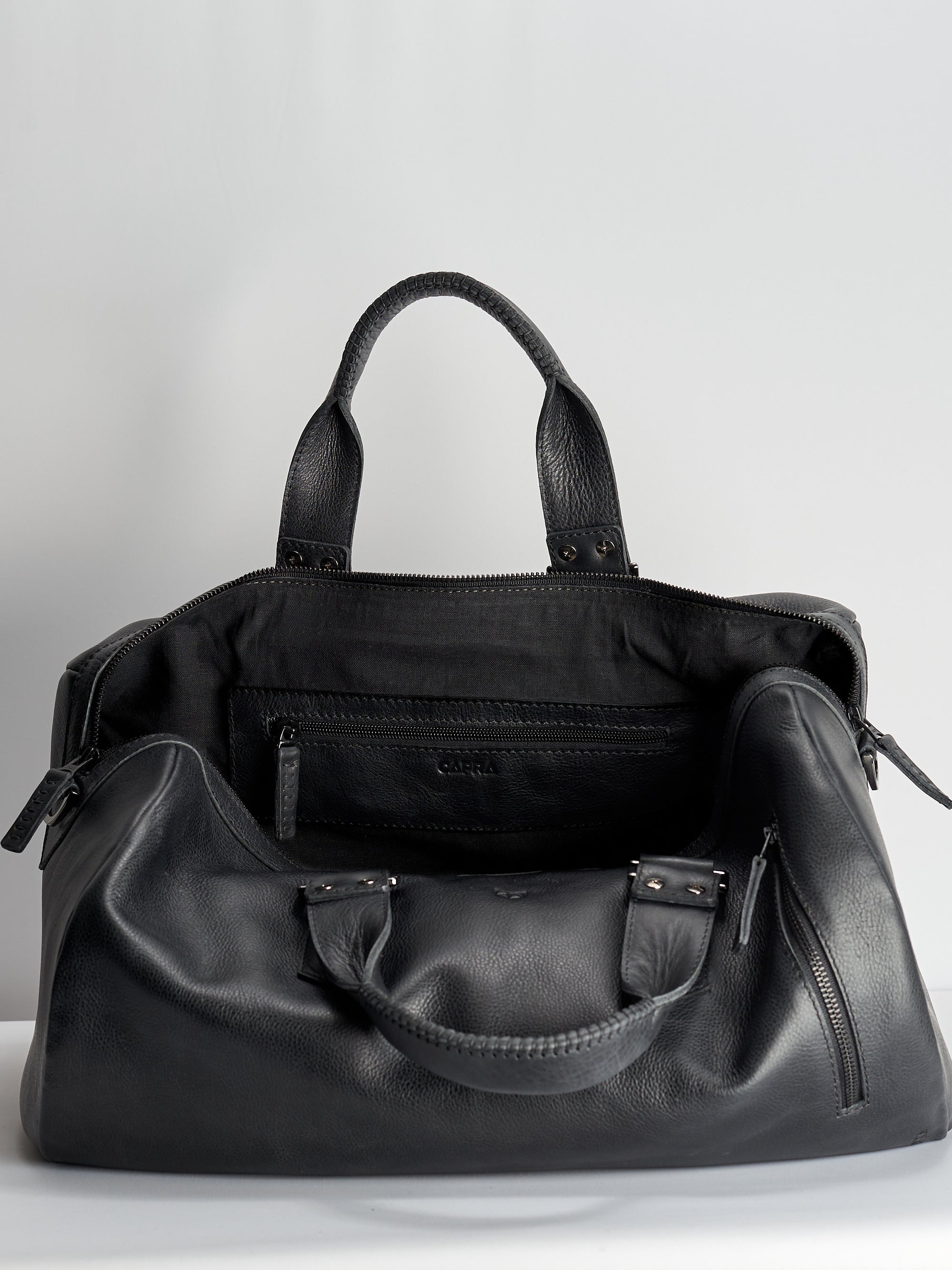 Linen interior. Black leather work out bag for men. Designer weekender travel bag 