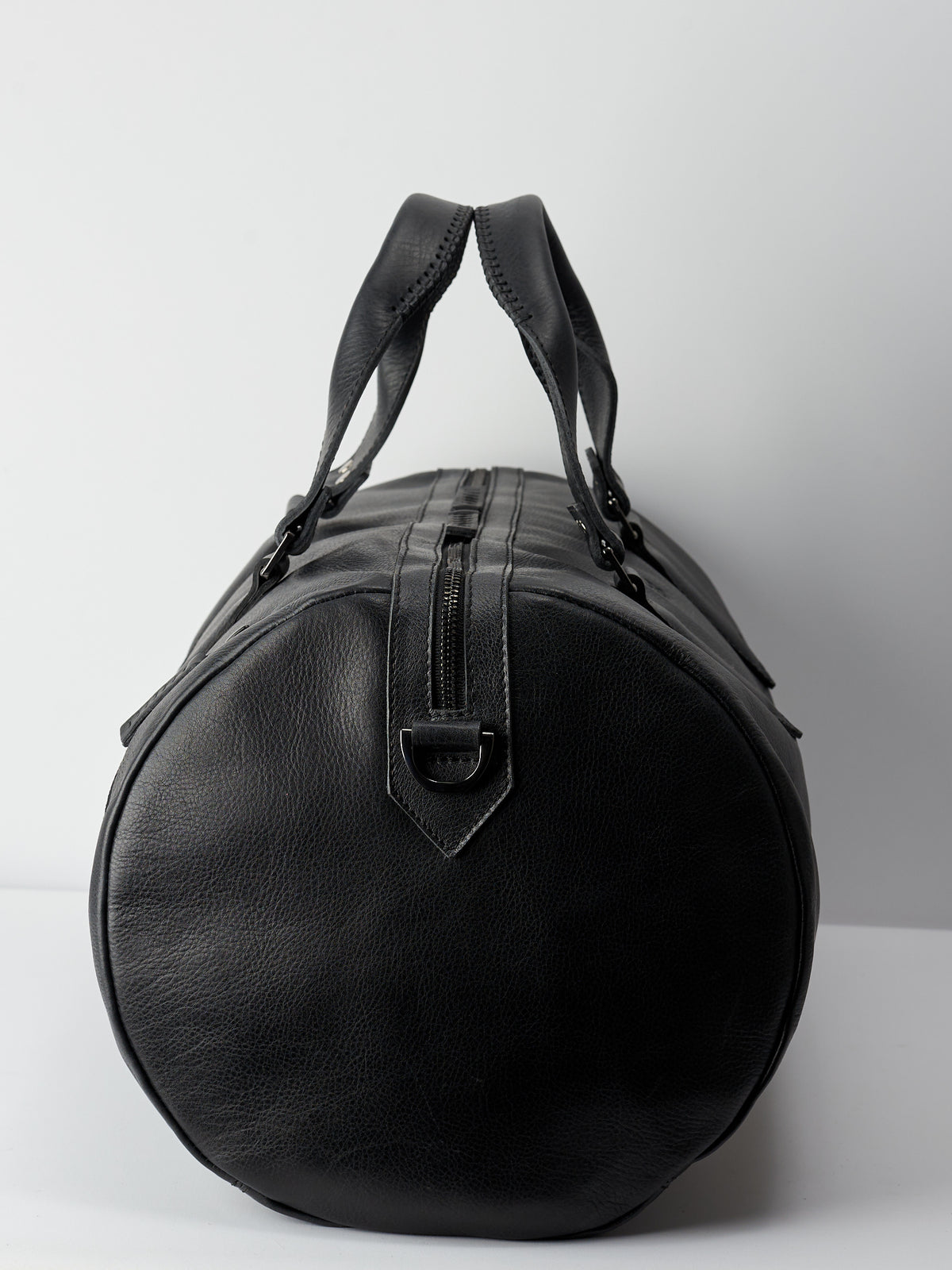 Angle. Handmade black leather holdall bag for mens gifts