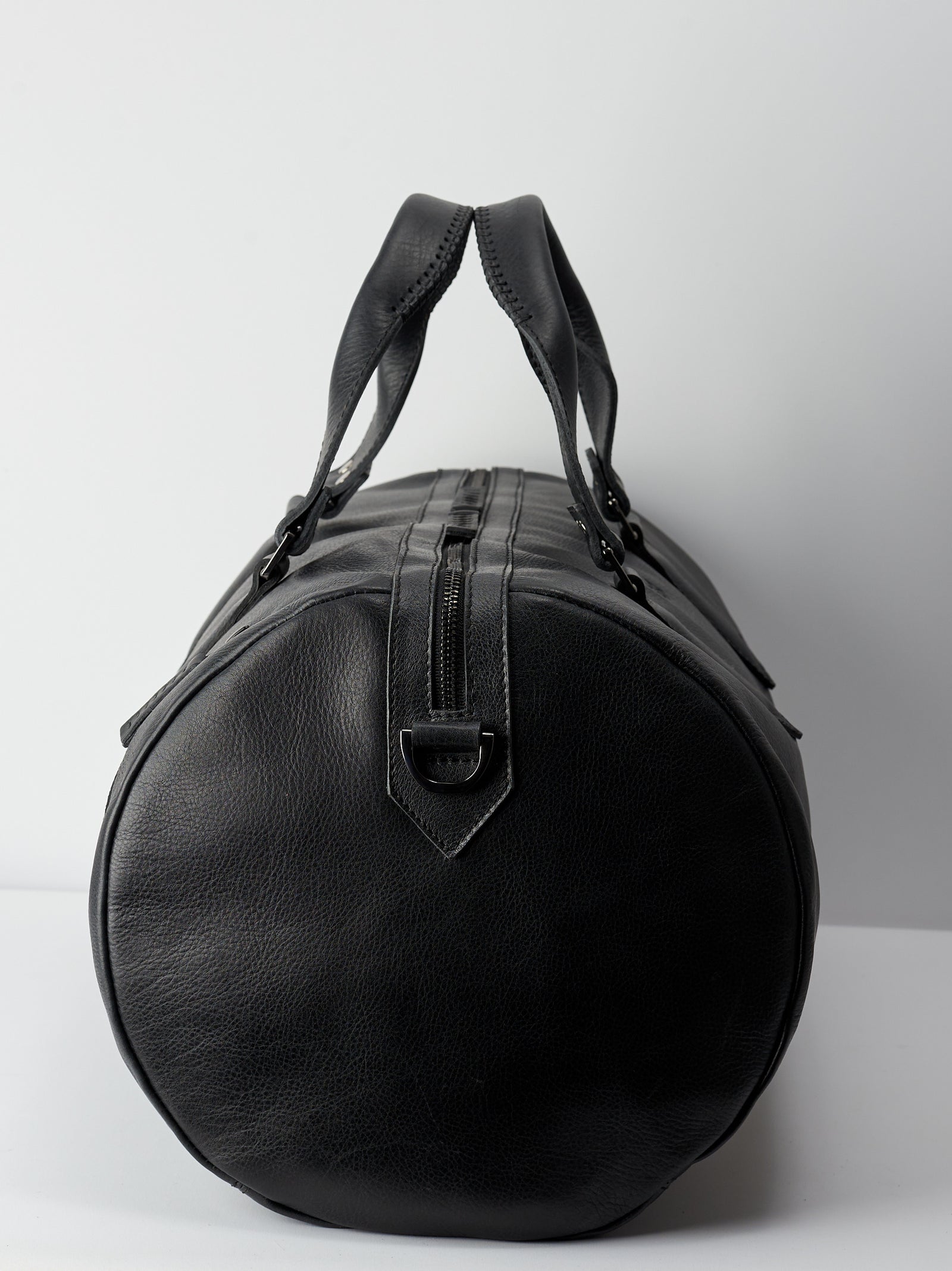 Angle. Handmade black leather holdall bag for mens gifts
