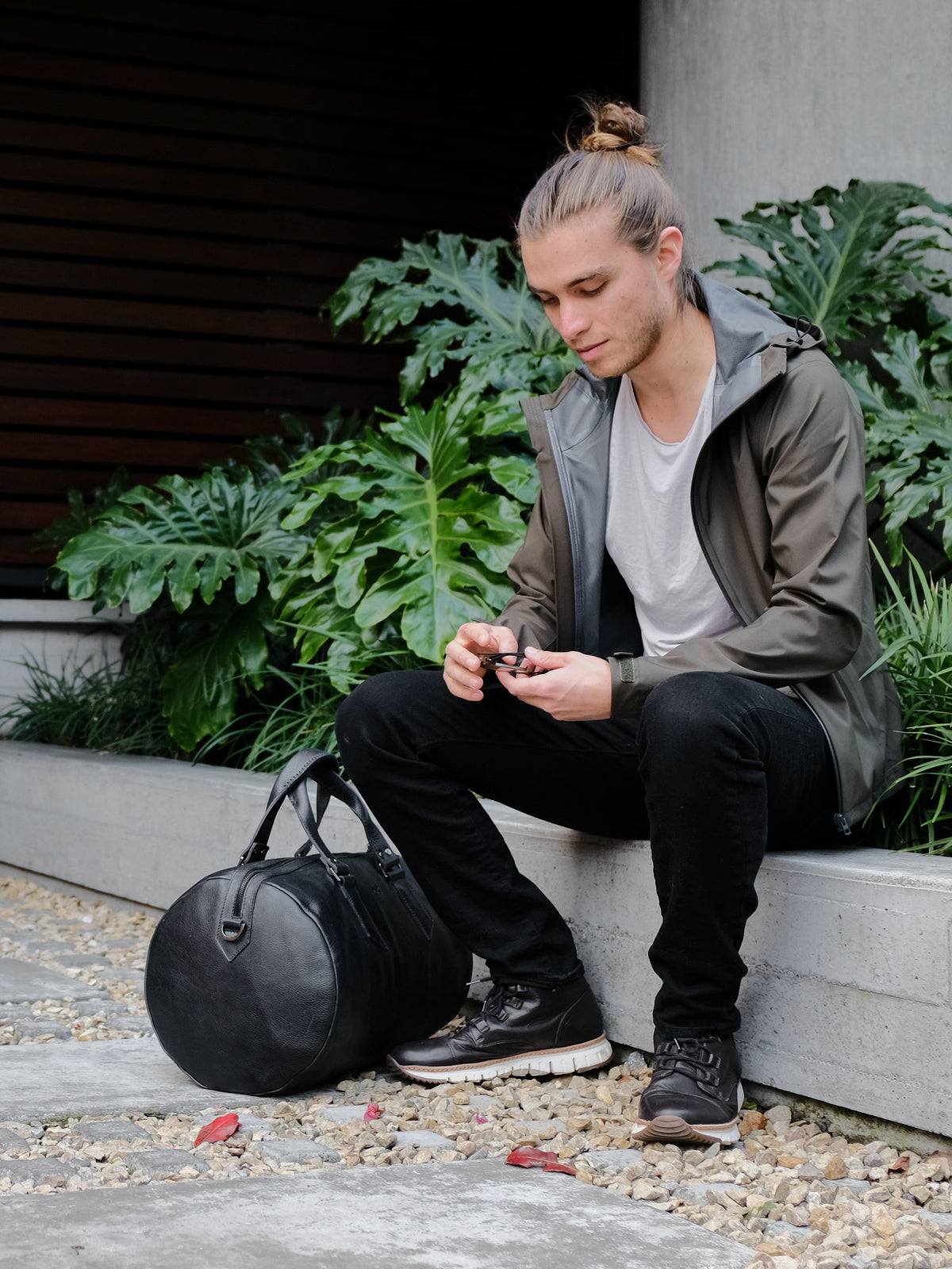 Urban style. Black designer leather weekender bag for men. Carryall shoulder bag 