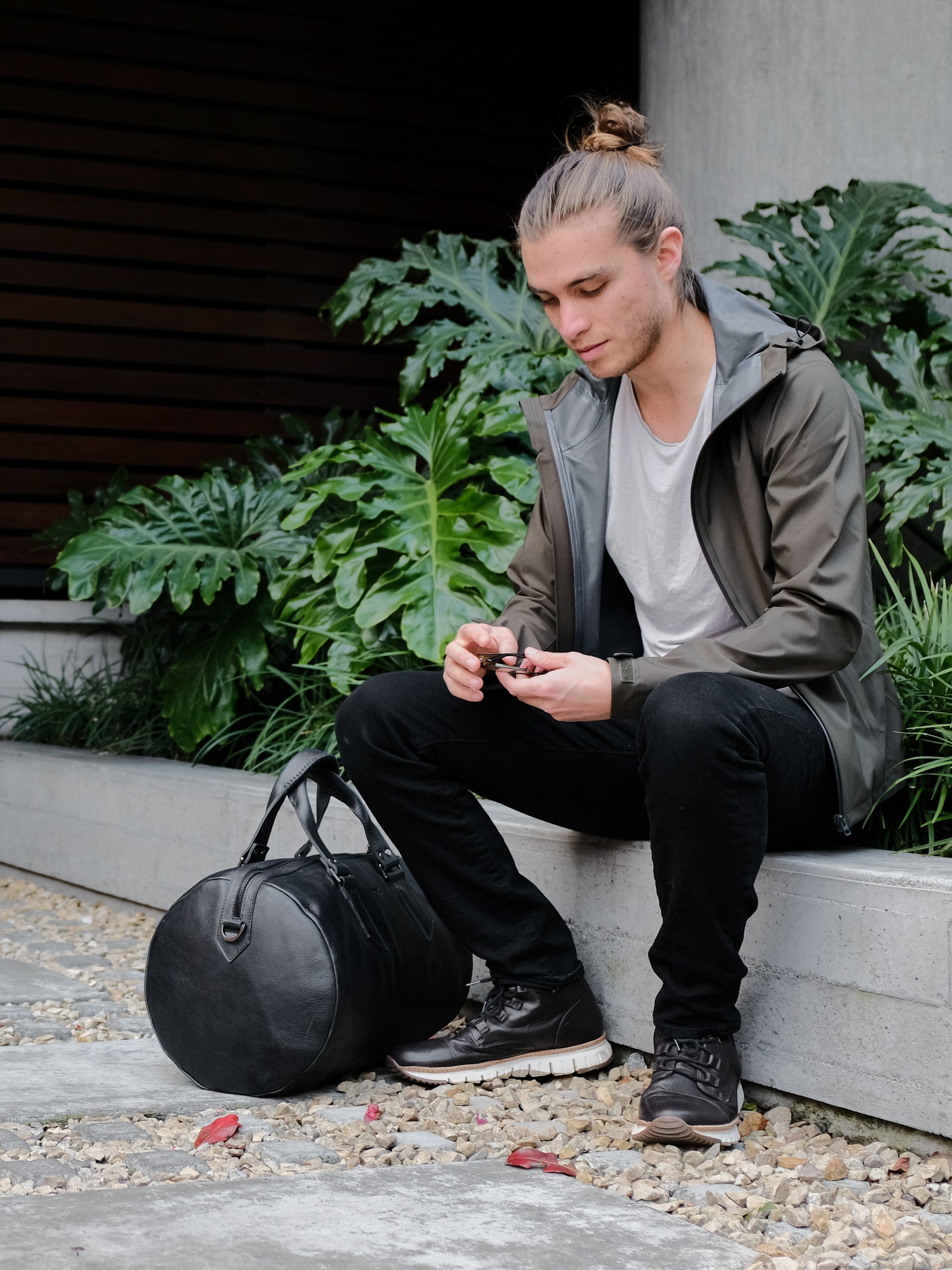 Urban style. Black designer leather weekender bag for men. Carryall shoulder bag 