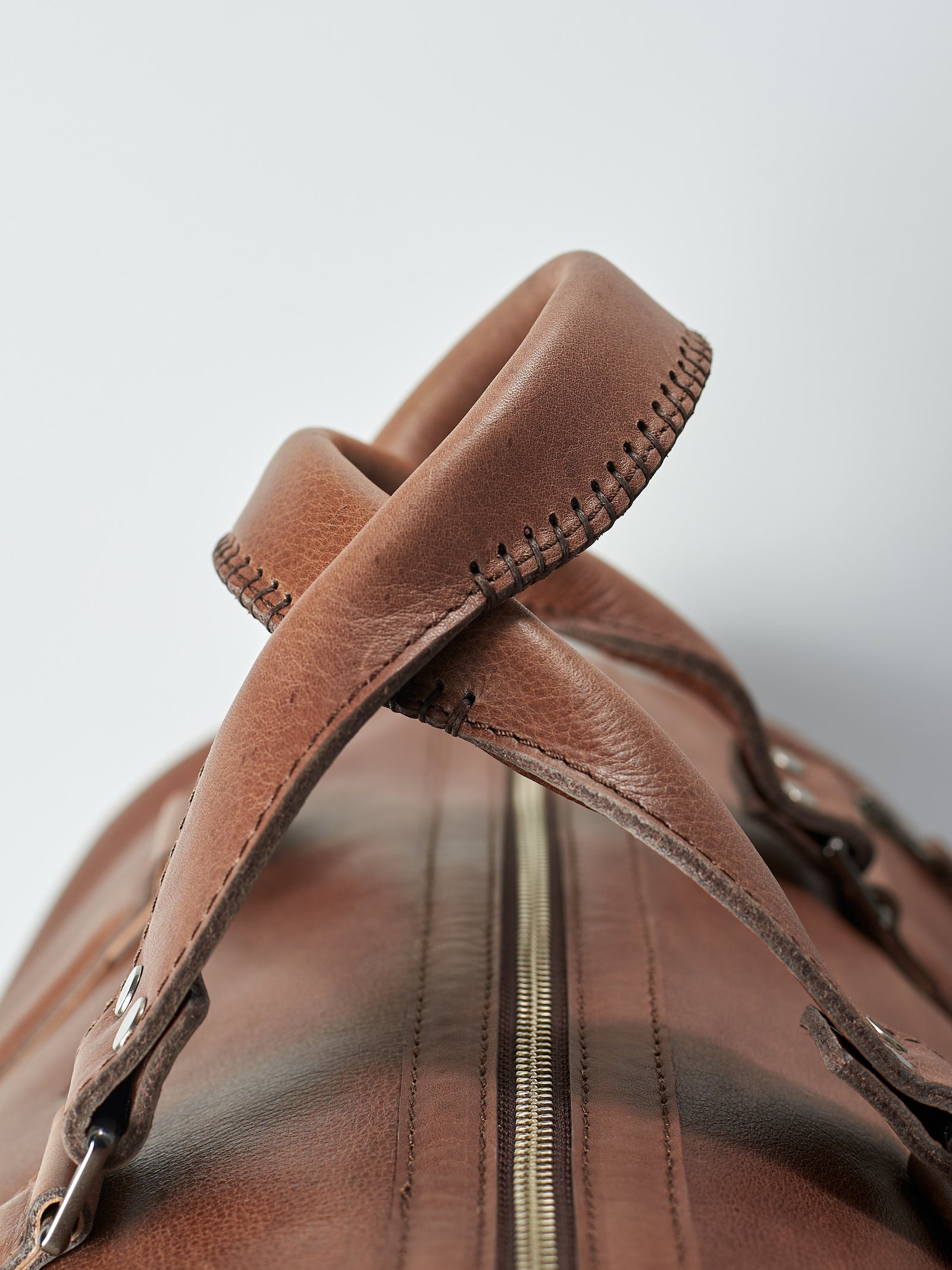 Hand stitched leather handles. Brown leather carryall bag. Mens travel weekender bag