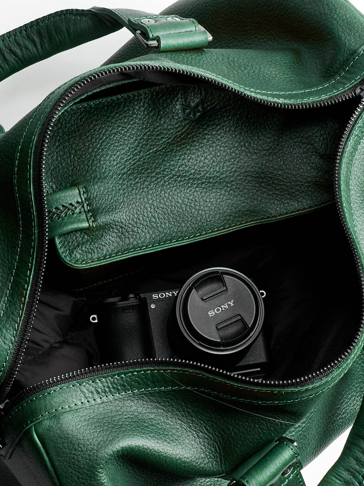 Travel luggage interior. designer leather weekender bag for men. Carryall shoulder bag 