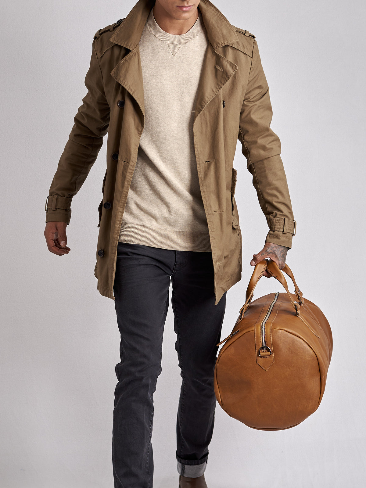 Substantial duffle bag tan by Capra Leather. Style side carry. 