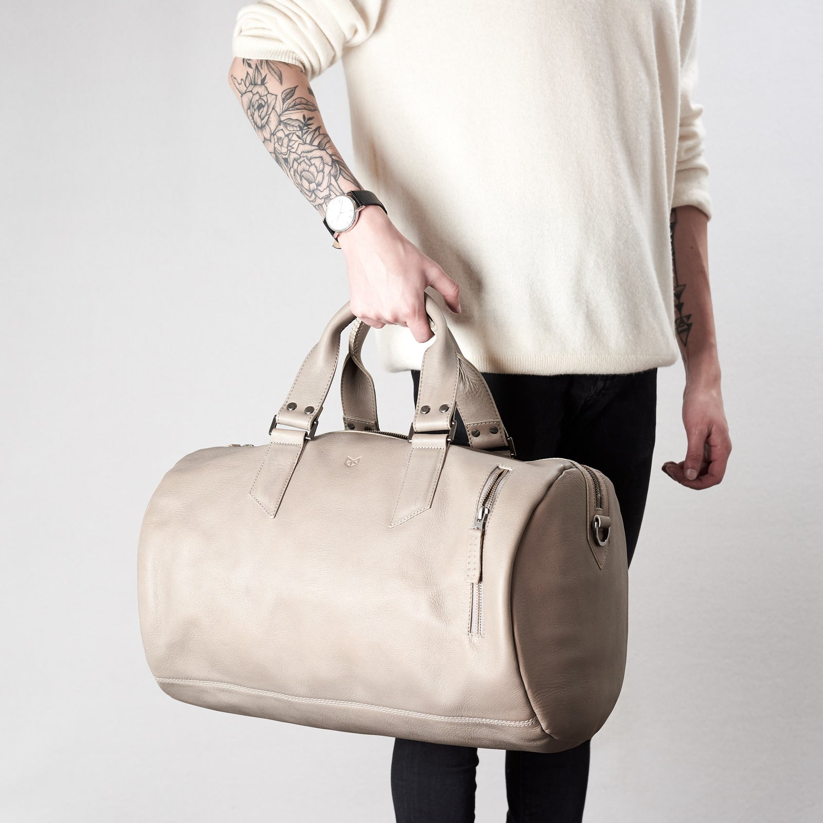 Style. Substantial grey duffle bag by Capra Leather. 