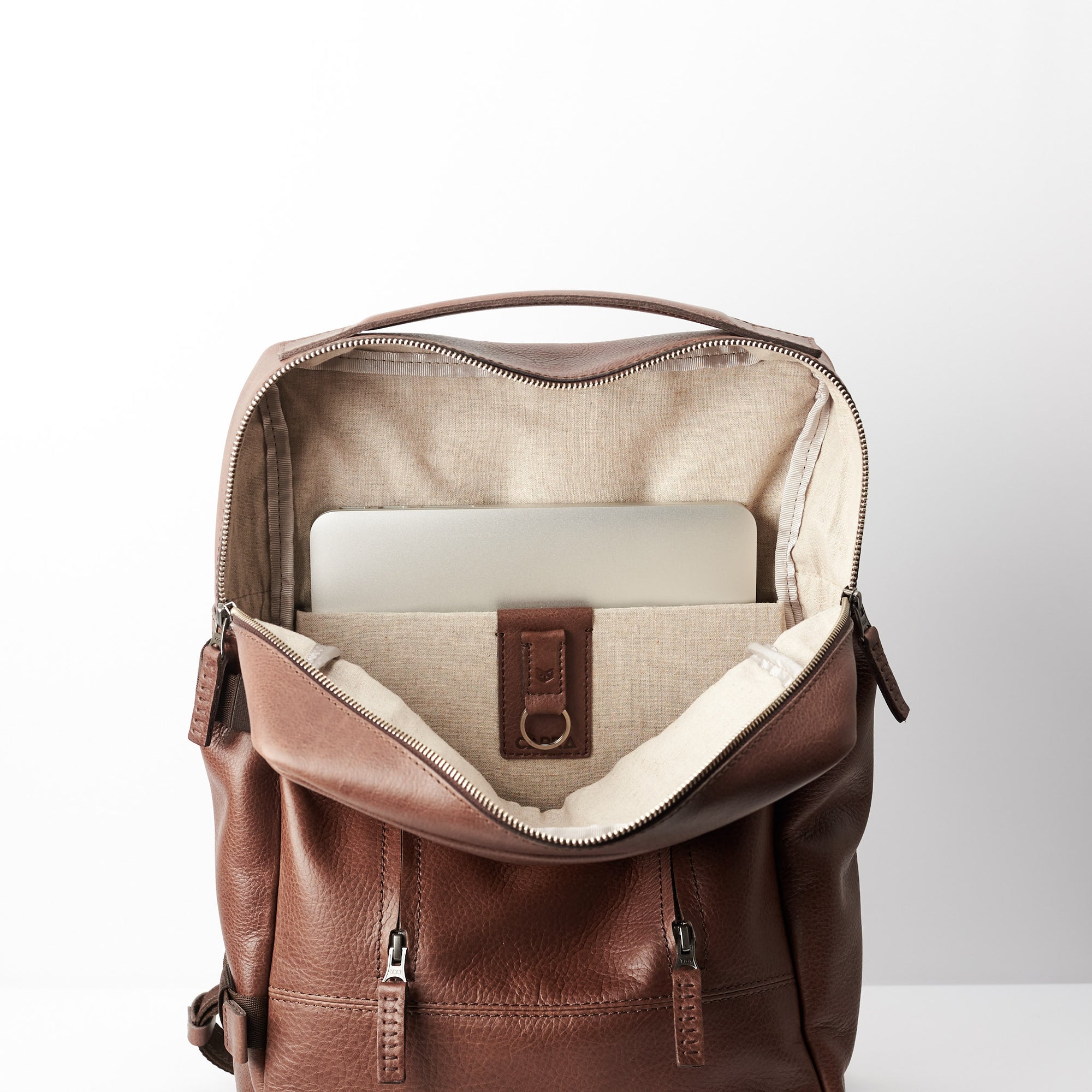 Linen interior Detail. Macbook pro inside pocket, leather backpack 