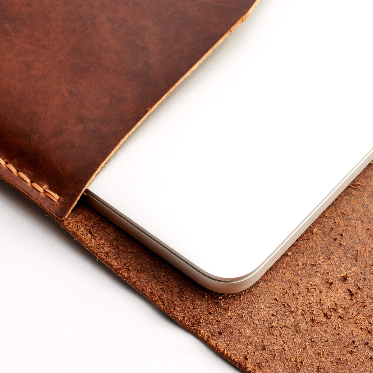 Interior detail tan leather case. from Dell XPS 13" 15" sleeve