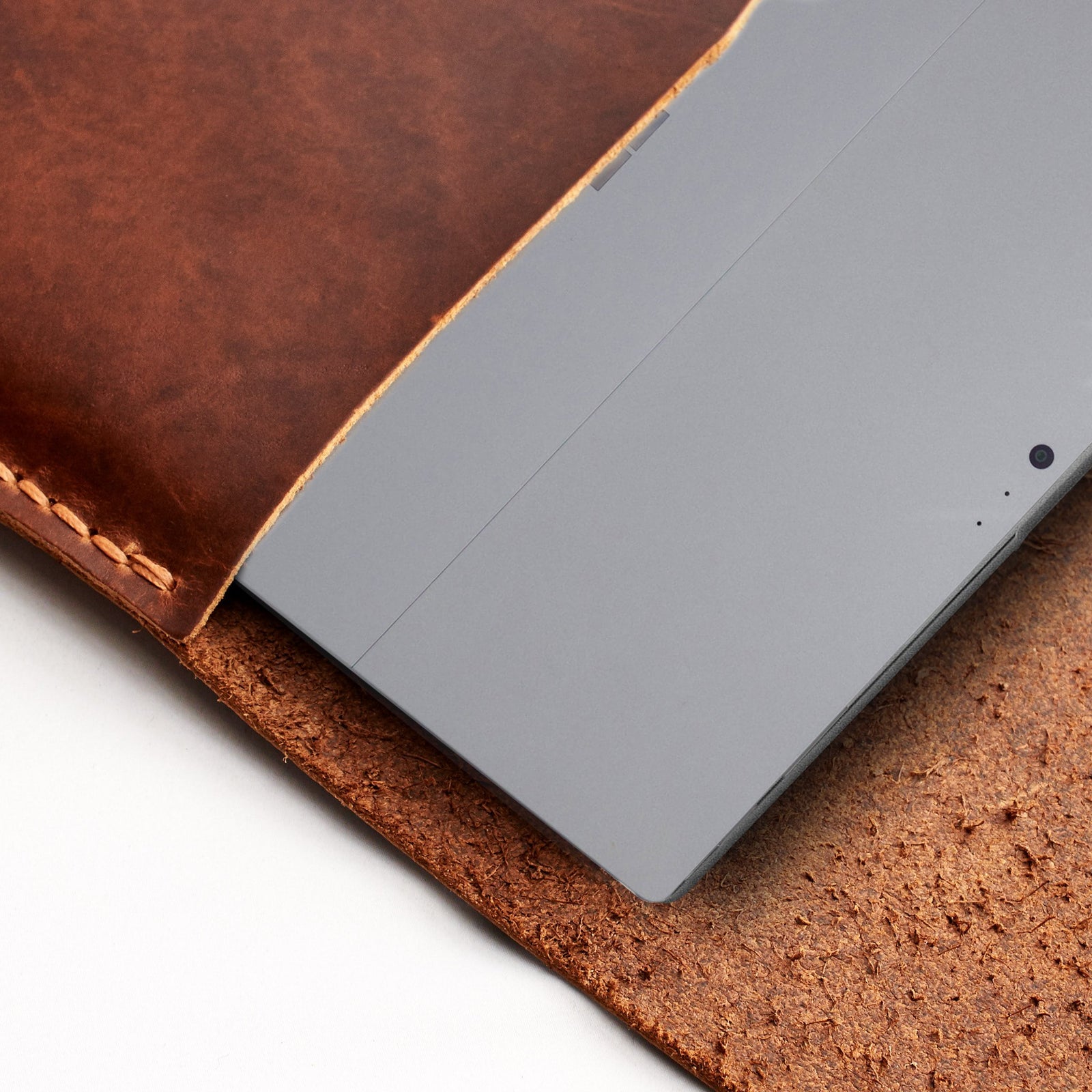 Soft interior detail. Tan leather Surface sleeve. Designer unique mens cases.