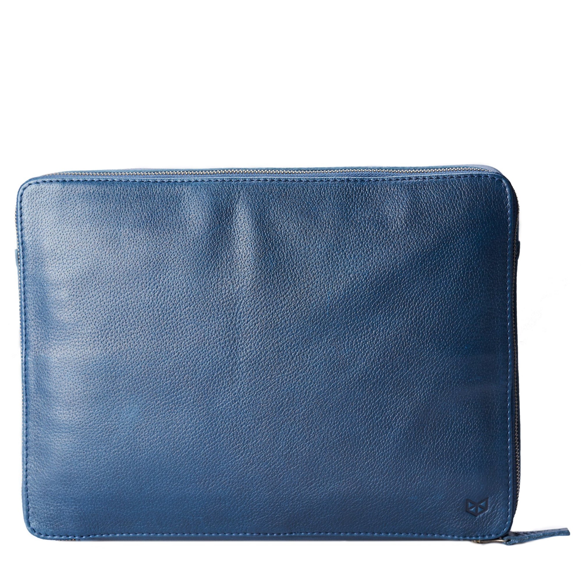 Navy blue leather tech pouch. Handmade tech gear bag by Capra Leather