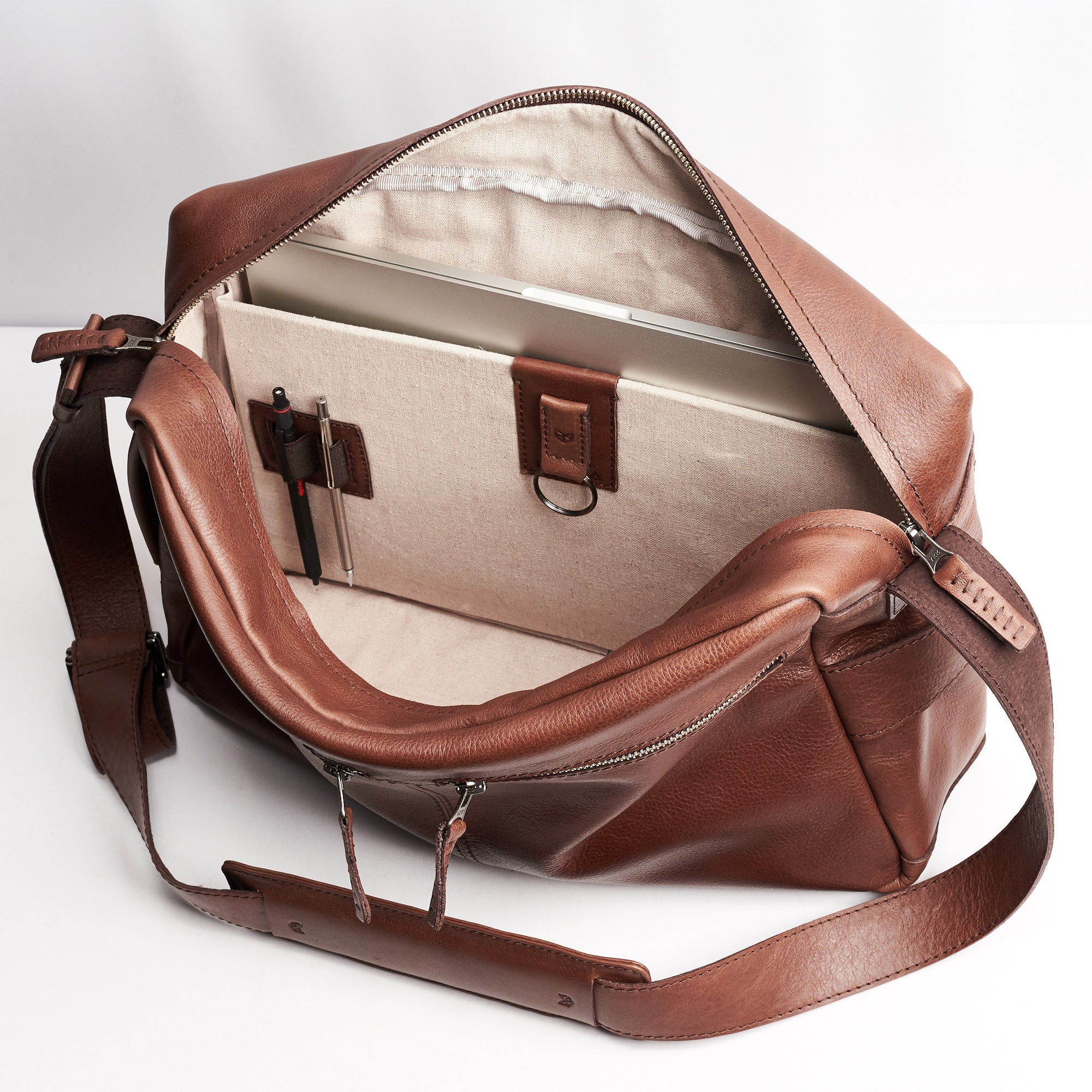 Linen interior. Brown handmade leather messenger bag for men. Commuter bag, laptop leather bag by Capra Leather.