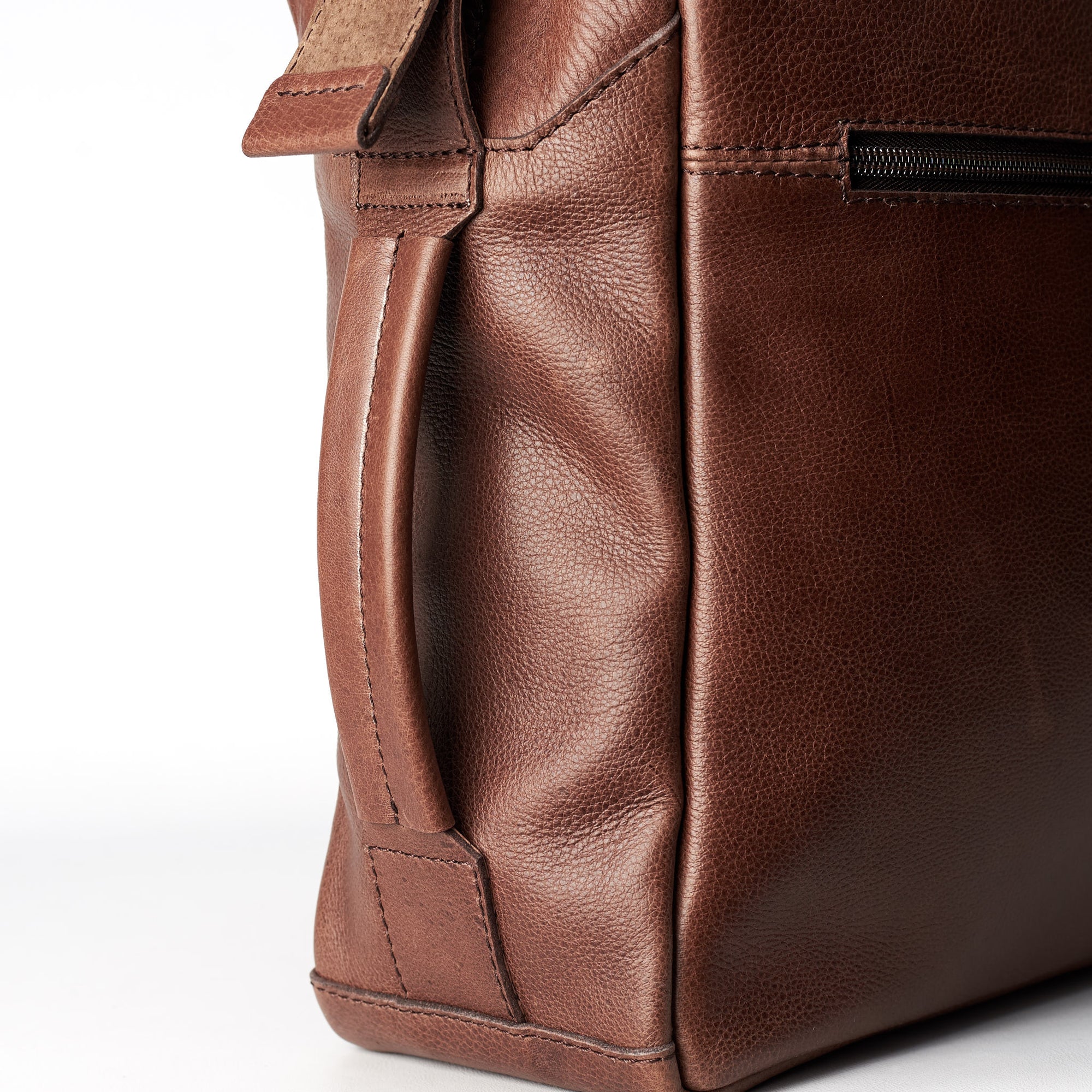 Handle Detail. Brown handmade leather messenger bag for men. Commuter bag, laptop leather bag by Capra Leather.