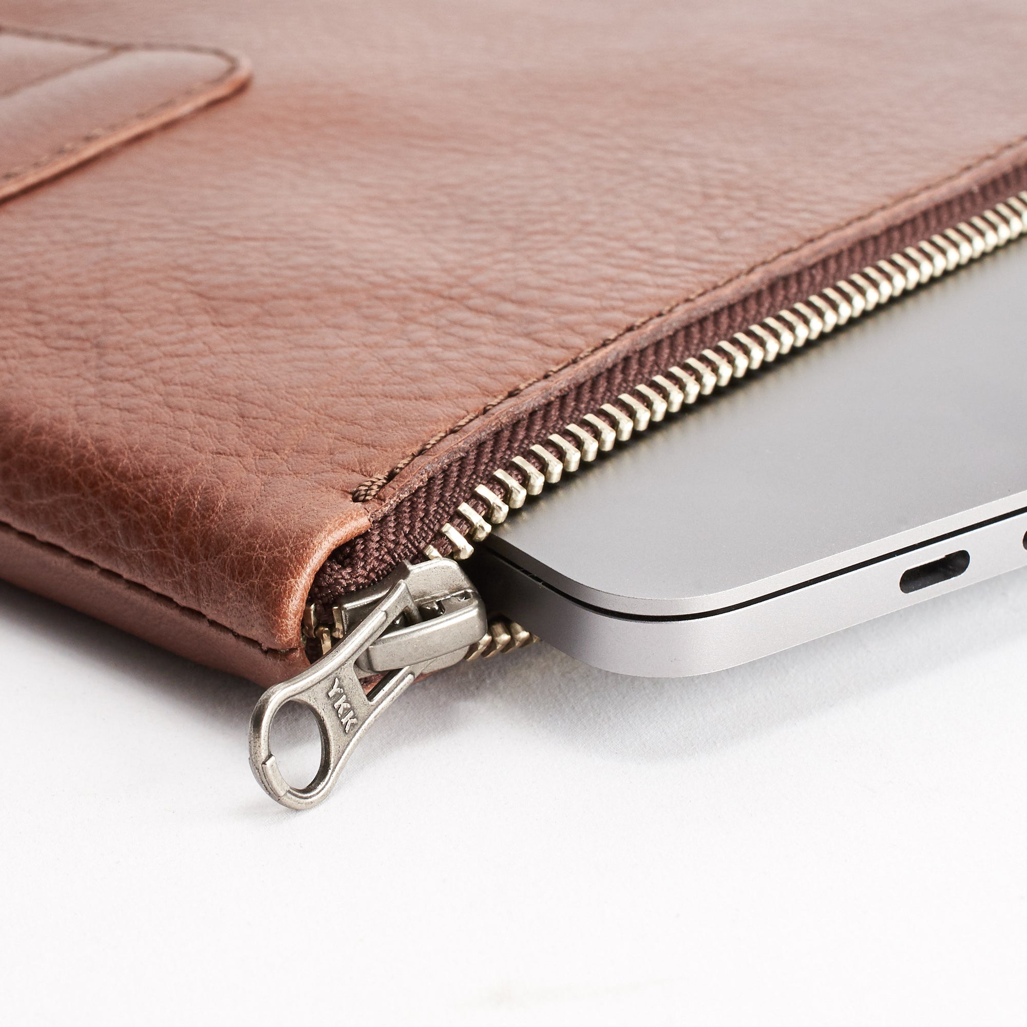 YKK metallic zippers. Handcrafted leather brown  laptop and documents portfolio case. 