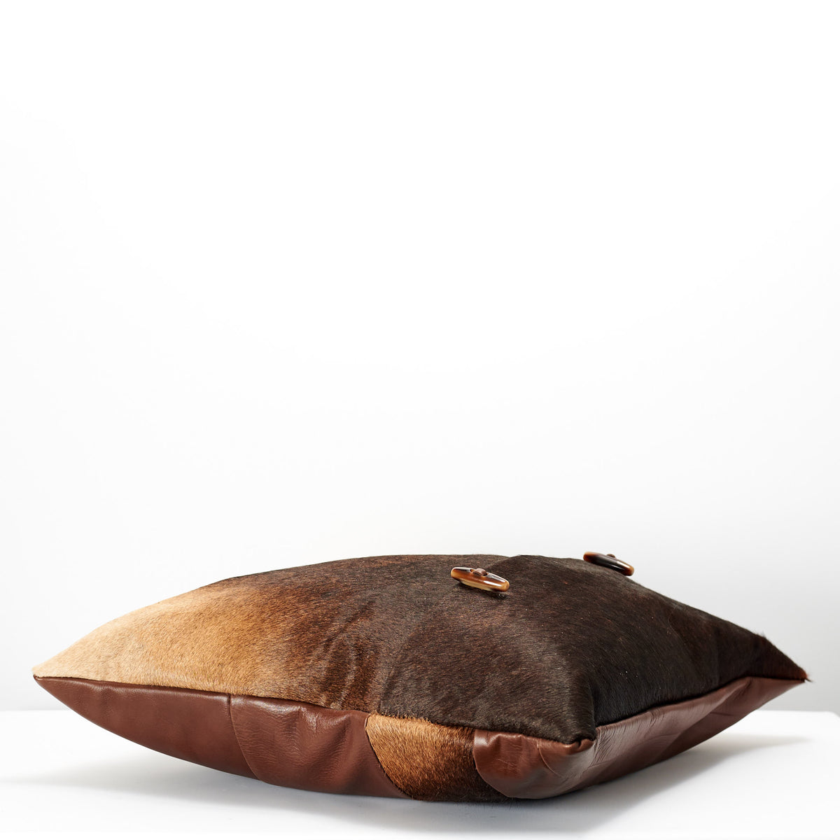 gradient from cowhide cushion surface