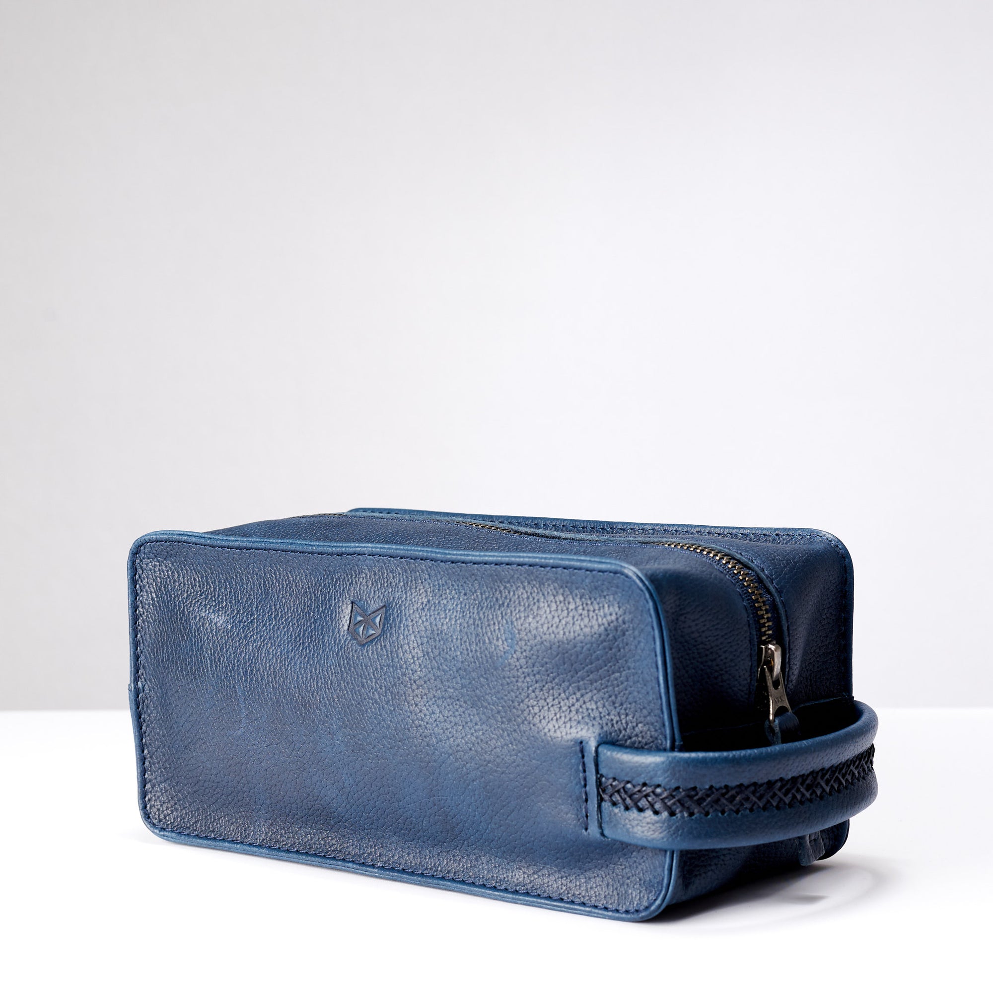 Sided. Ocean blue leather toiletry, shaving bag with hand stitched handle. Groomsmen gifts. Leather good crafted by Capra Leather 