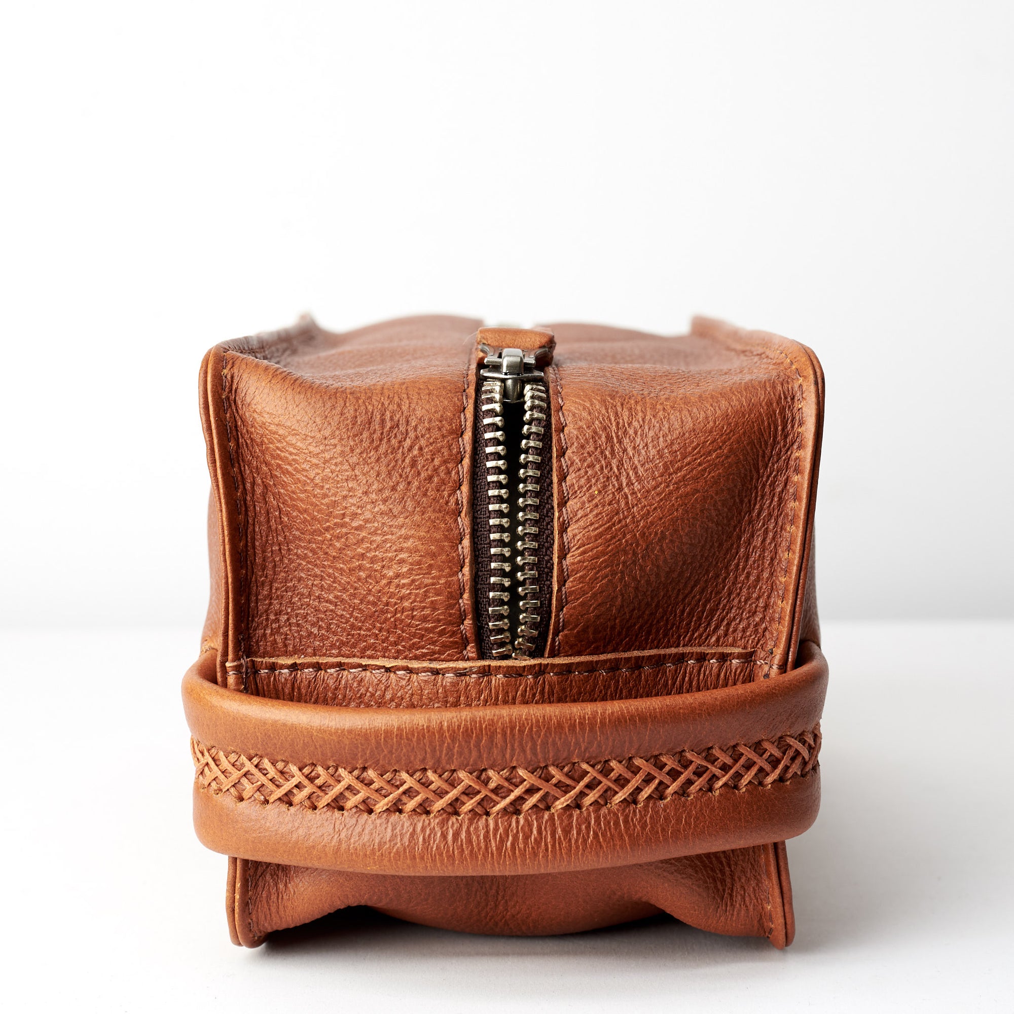 Handler. Tan leather toiletry, shaving bag with hand stitched handle. Groomsmen gifts. Leather good crafted by Capra Leather 