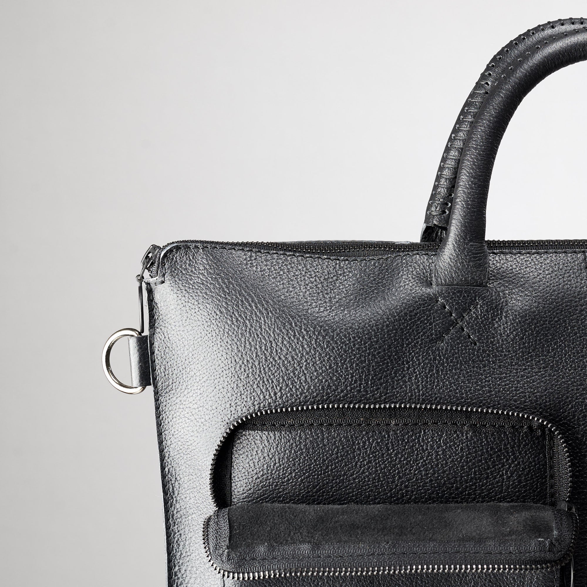 Suede pocket detail. Black tote zipper bag by Capra Leather. Handmade men work bag.