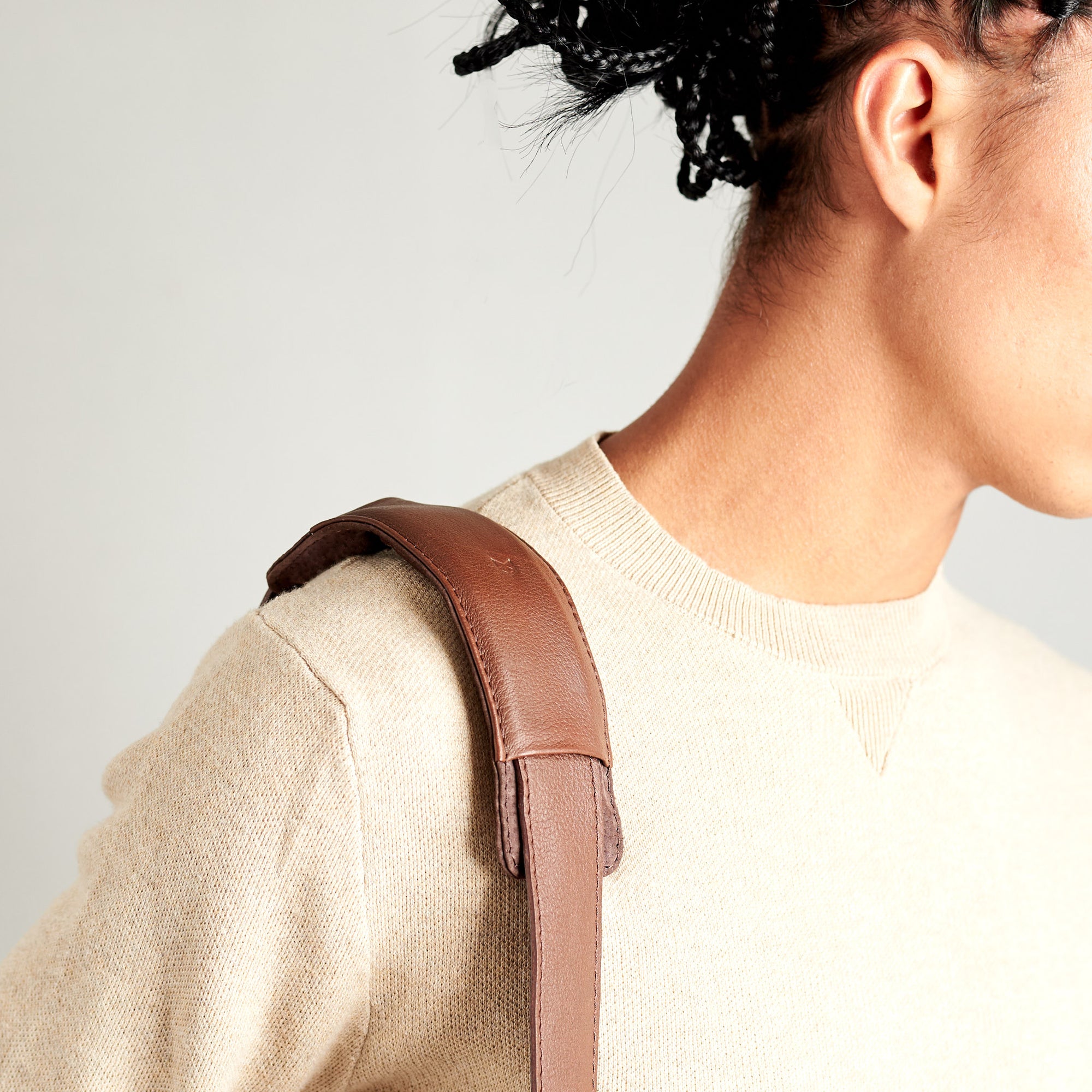 Style strap detail. Brown tote zipper bag by Capra Leather. Handmade men work bag.
