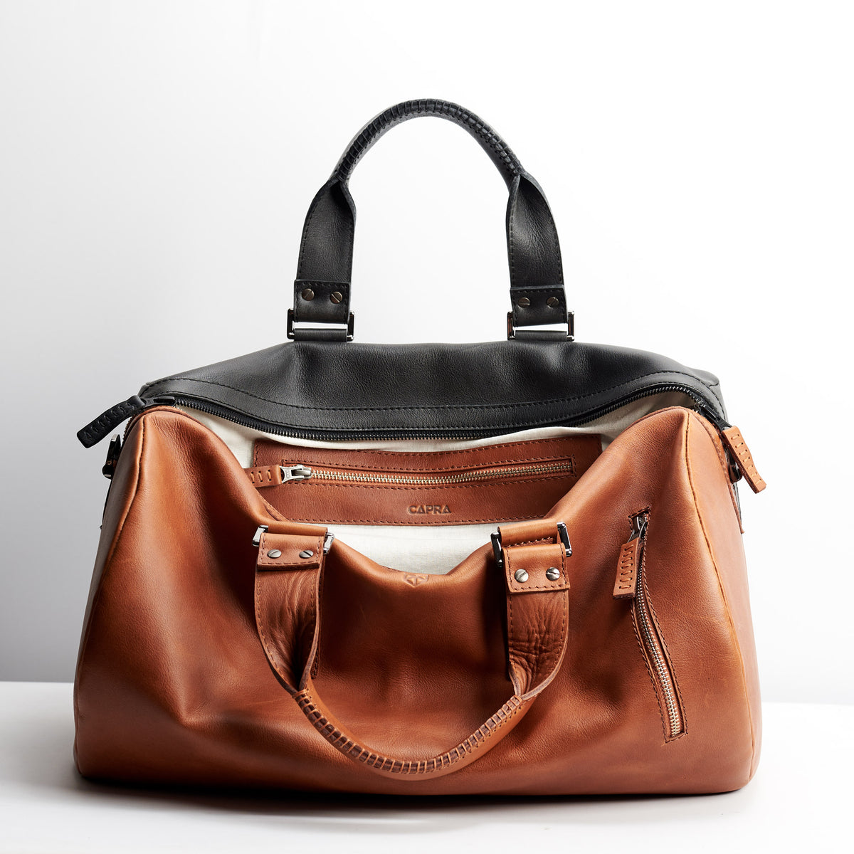 Linen interior. Double color men's duffle bag. Limited edition designer product. Unique weekender for travel. 