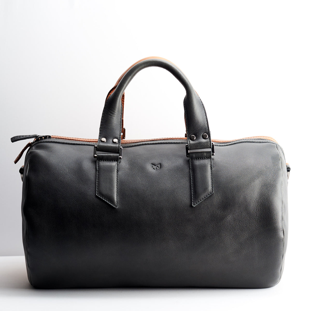 Back. Carry on luggage size. Handbag fashion design. Stylish gym bag to carry all your essentials and clothes. 
