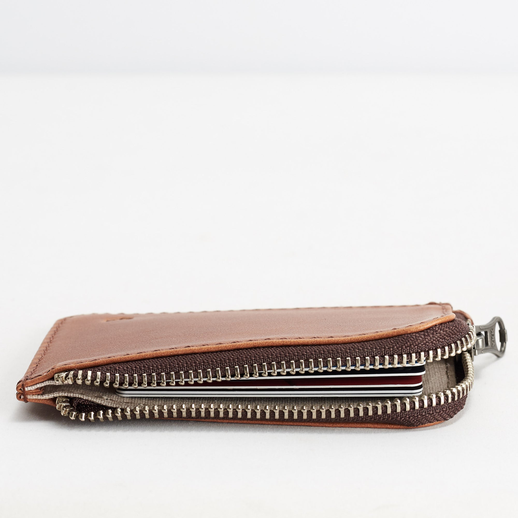 Slim profile. Cover. Minimalist tan zipper card holder. Men's bills and coins wallet. Slim designer credit cards holder