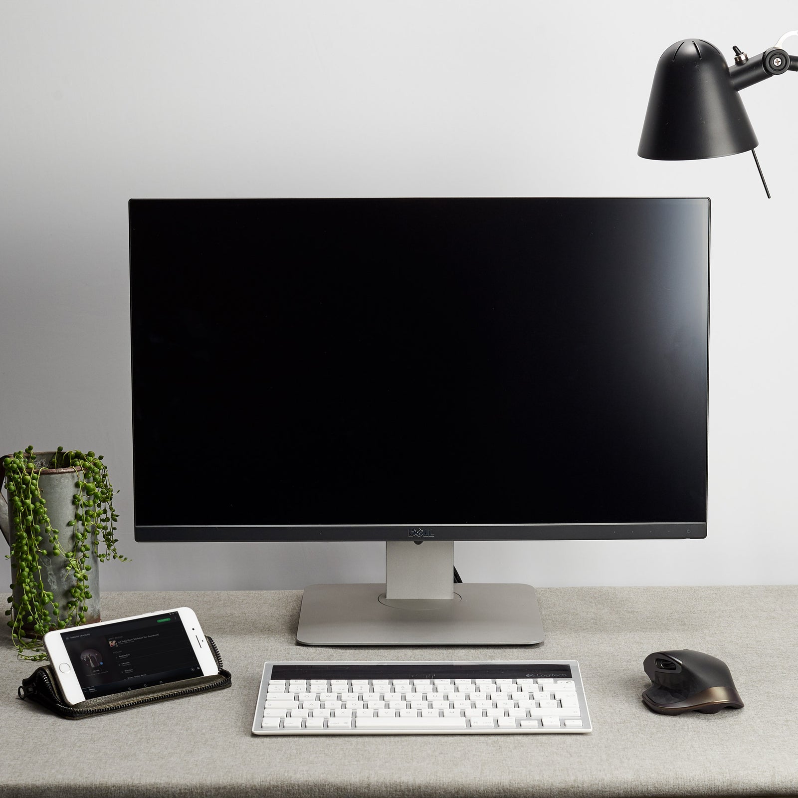 Office desk. Green iPhone leather wallet stand case for mens gifts. iPhone x, iPhone 10, iPhone 8 plus leather stand sleeve