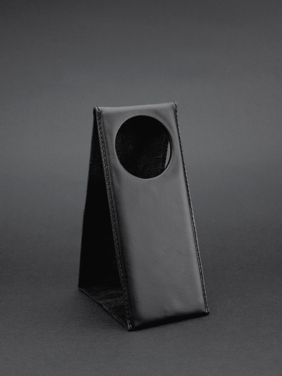 Cable management system. MagSafe iPhone Holder Stand Black by Capra Leather