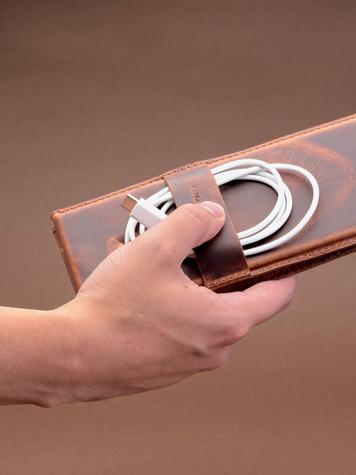 Easy to carry. MagSafe iPhone Holder Stand Distressed Tan by Capra Leather