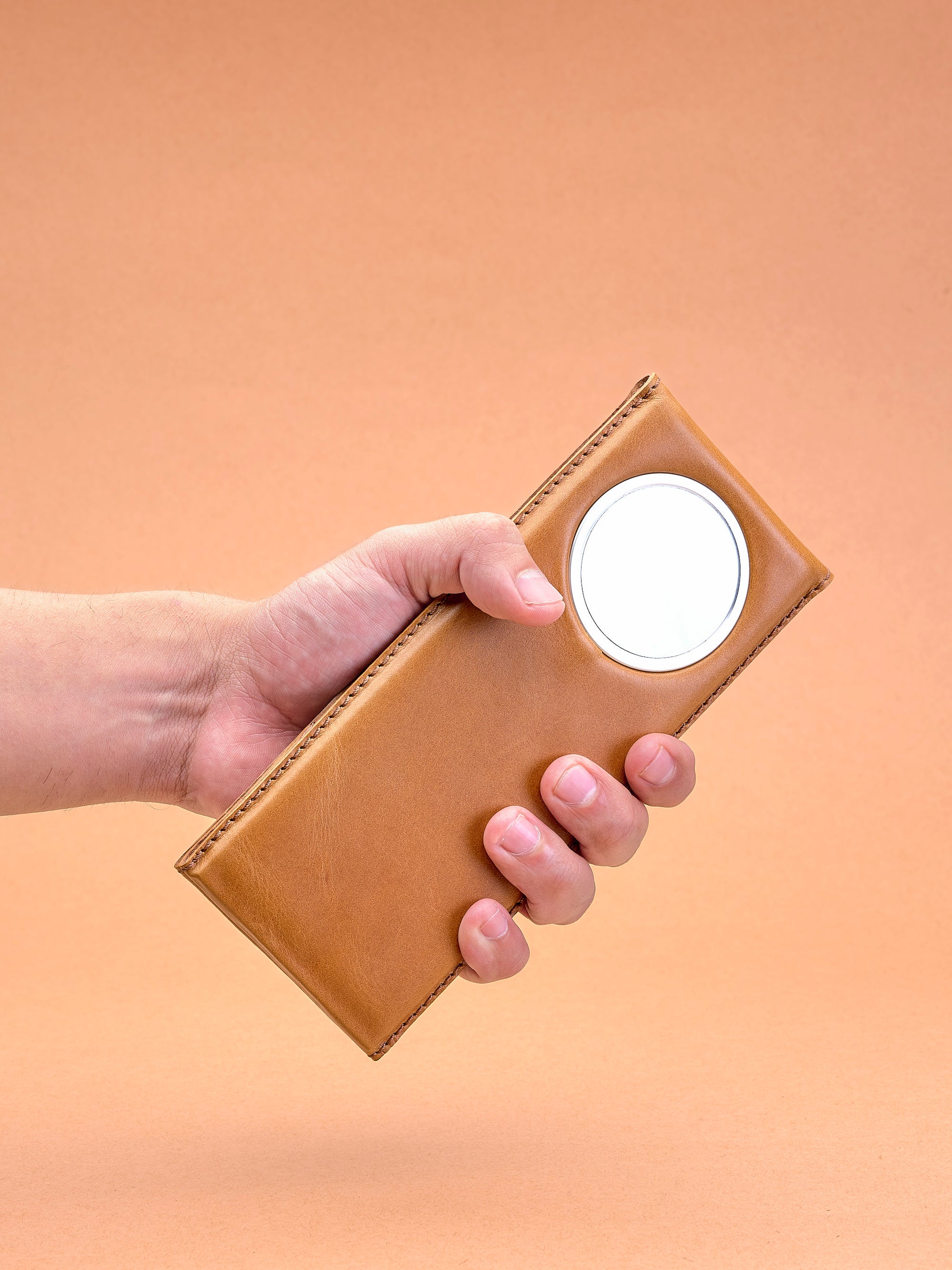 Easy to carry. MagSafe iPhone Holder Stand Tan by Capra Leather