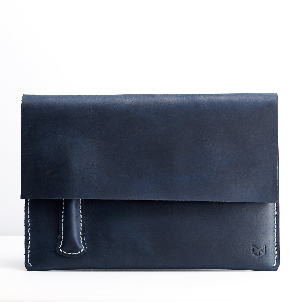 Closed. Blue handcrafted leather reMarkable tablet case. Folio with Marker holder. Paper E-ink tablet minimalist sleeve design. 